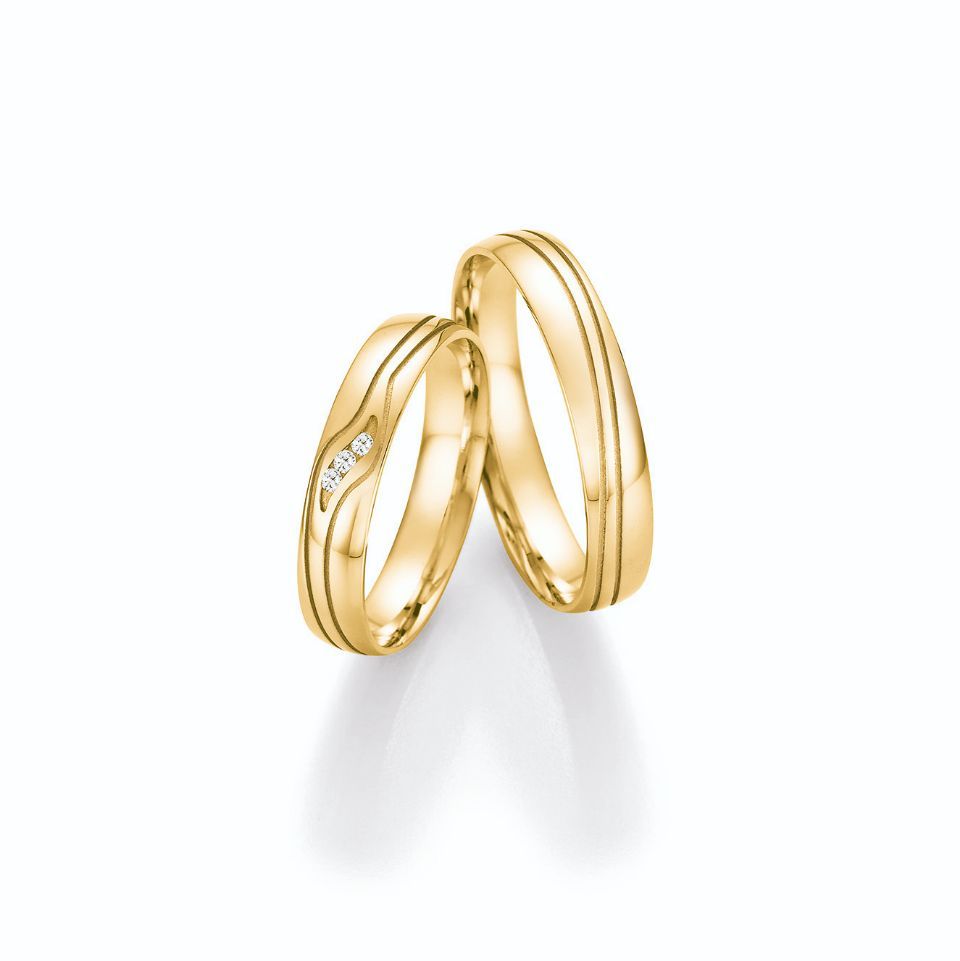 Einfarbige Hochzeitsringe in Silber mit Diamanten