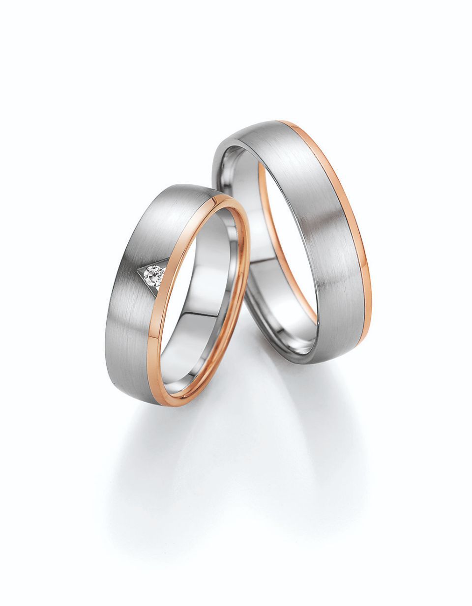 Hochzeitsringe in bicolor mit Silber, Roségold und Stein