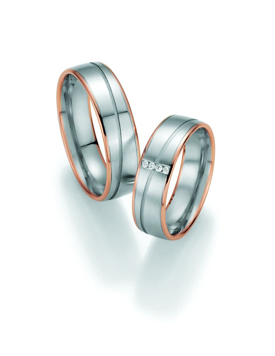 Hochzeitsringe in bicolor mit Silber, Roségold und Stein