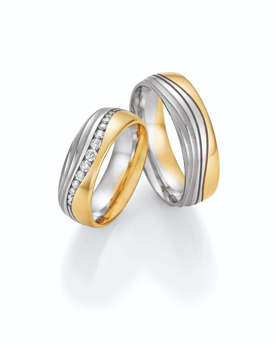 Hochzeitsringe in bicolor mit Silber, Gold und Stein