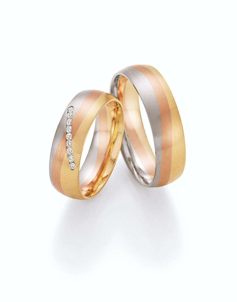 Hochzeitsringe in tricolor mit Gold, Roségold und Silber mit Stein