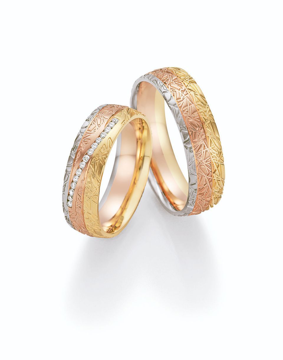 Hochzeitsringe in bicolor mit Silber, Gold und Stein