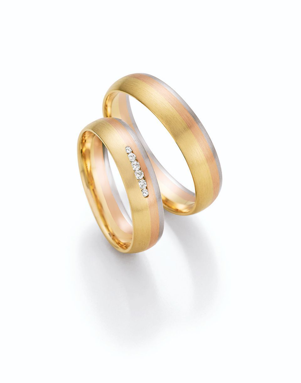 Hochzeitsringe in bicolor mit Silber, Gold und Stein