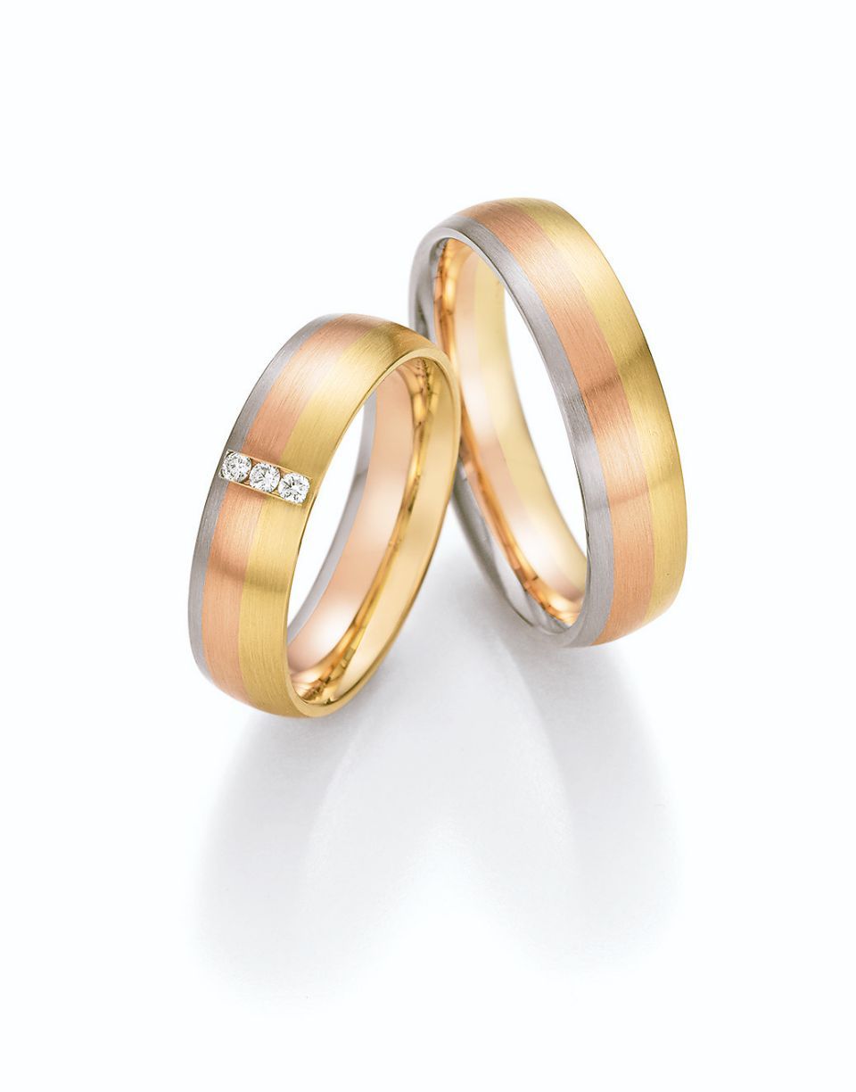 Hochzeitsringe in bicolor mit Silber, Gold und Stein