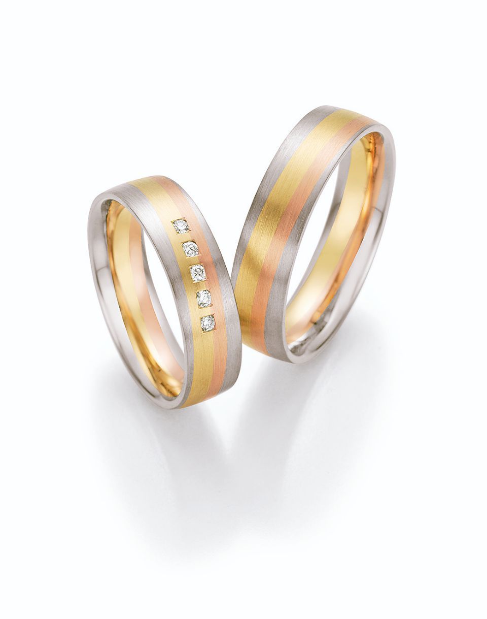 Hochzeitsringe in bicolor mit Gold und Edelstahl mit Stein