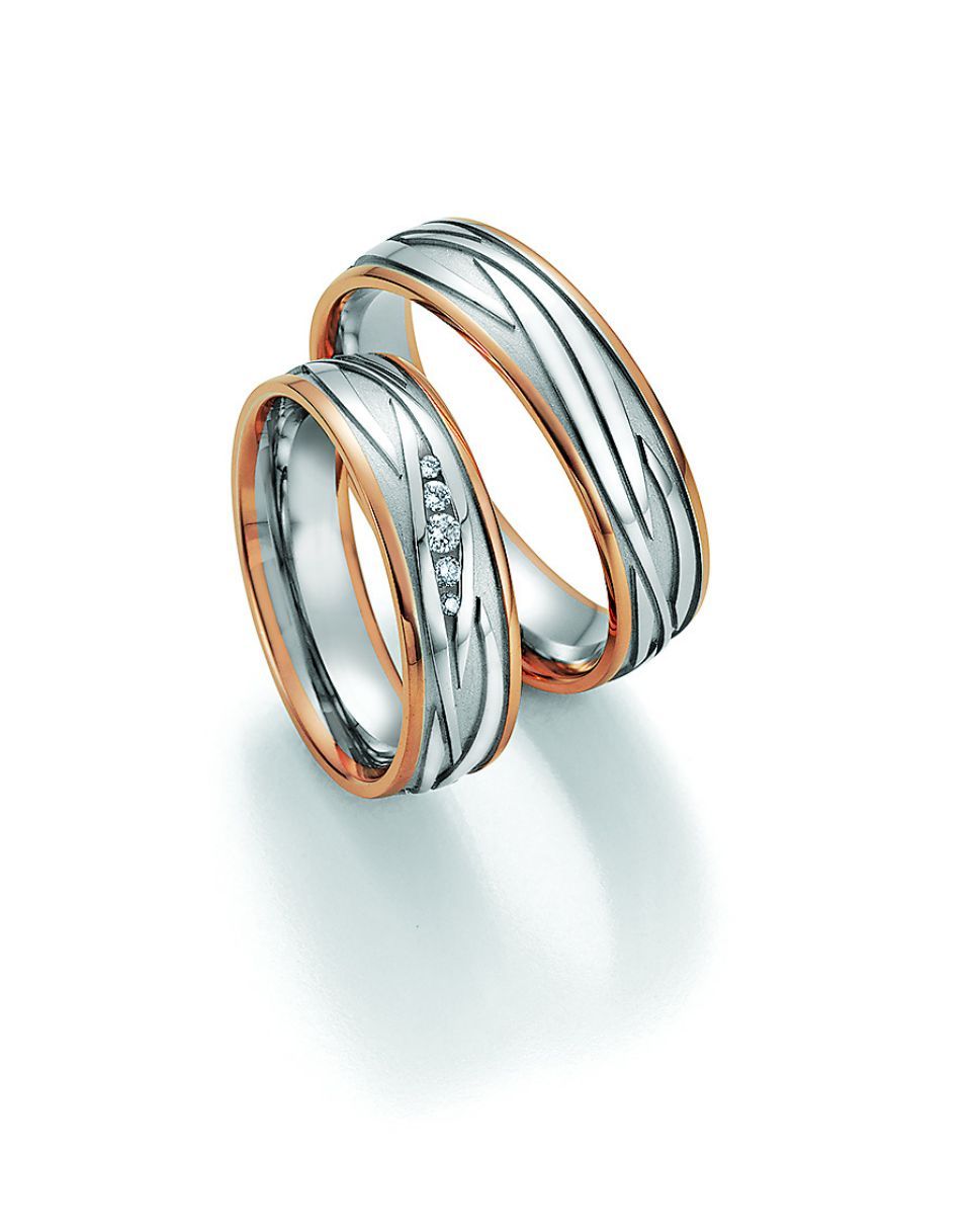 Hochzeitsringe in bicolor mit Gold und Edelstahl mit Stein