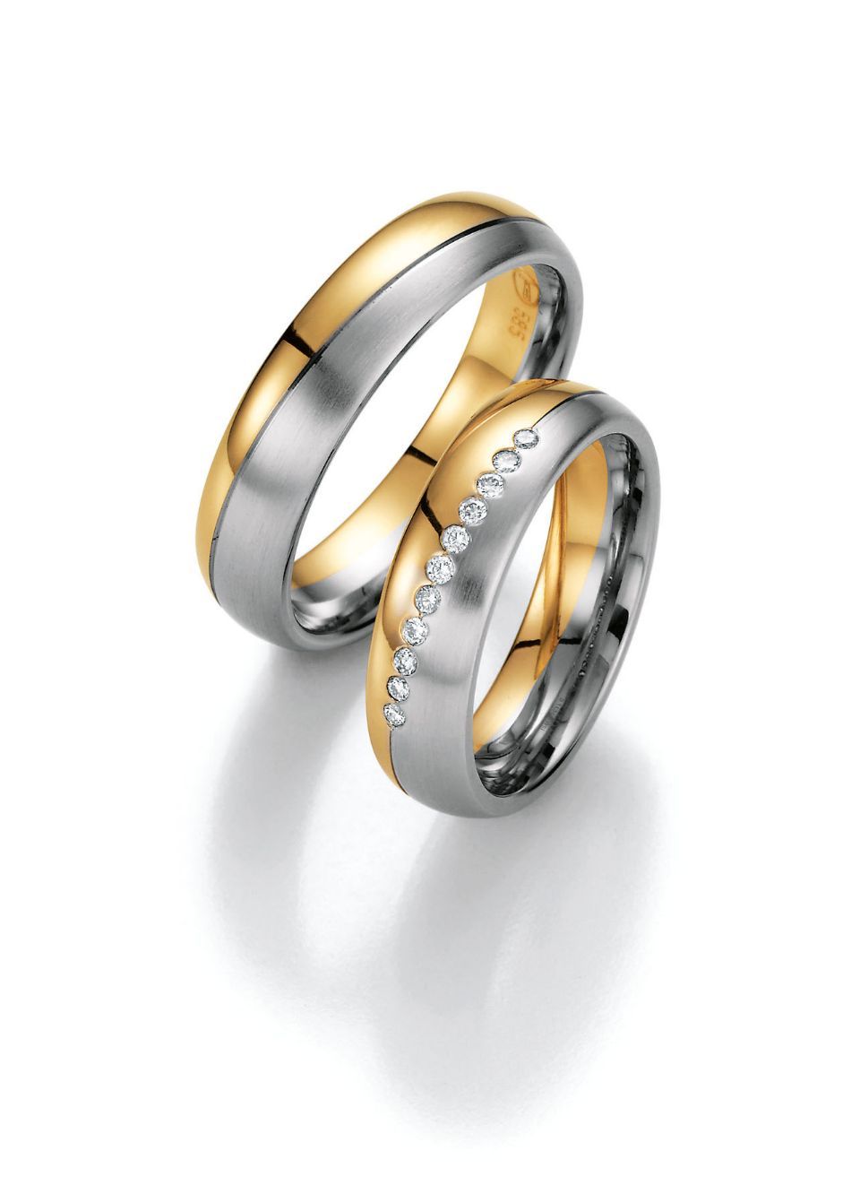 Hochzeitsringe in bicolor mit Gold, Edelstahl und Stein
