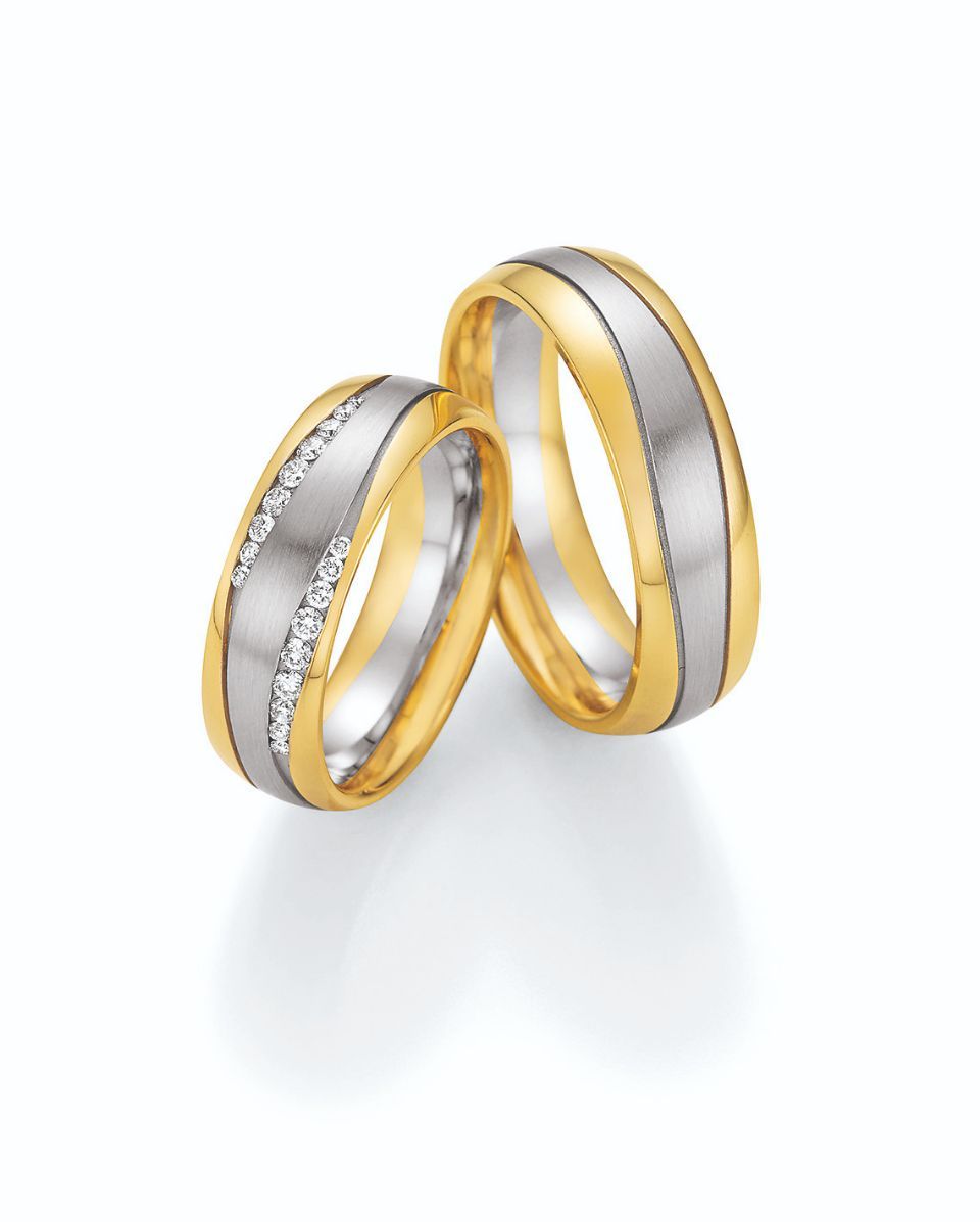 Hochzeitsringe in bicolor mit Silber, Gold und Stein