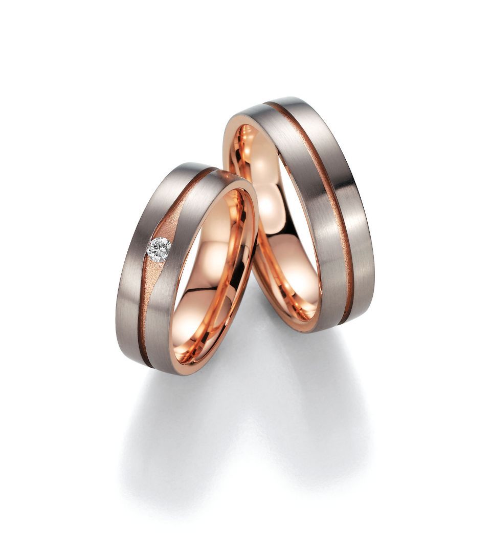 Hochzeitsringe in bicolor mit Edelstahl, Roségold und Stein