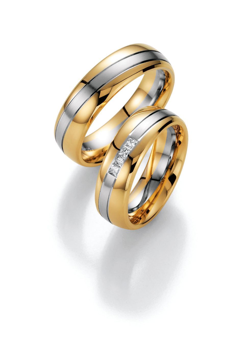 Hochzeitsringe in bicolor mit Gold, Edelstahl und Stein