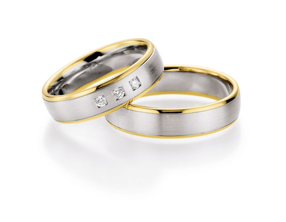 Hochzeitsringe in bicolor mit Silber, Gold und Stein