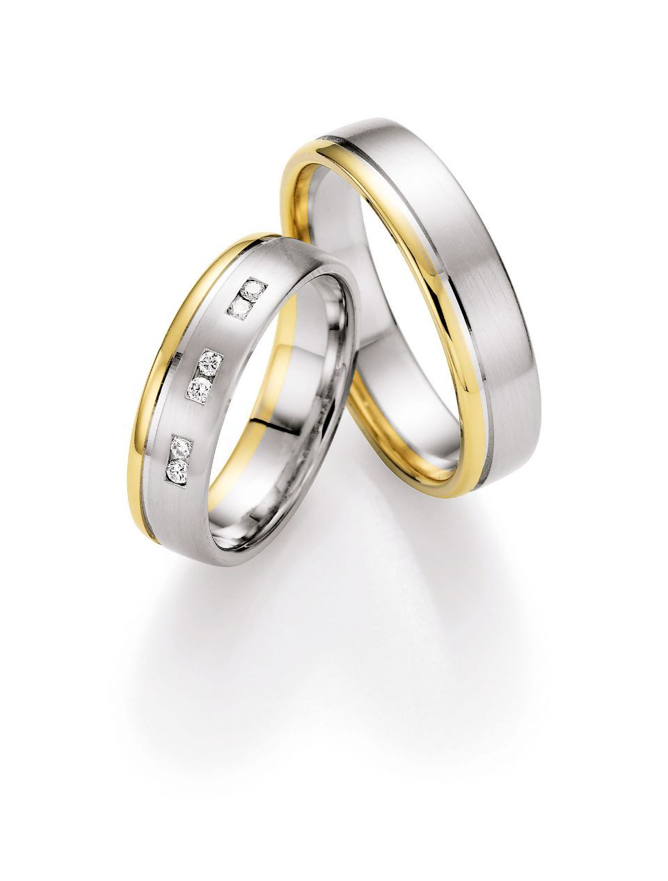Hochzeitsringe in bicolor mit Silber, Gold und Stein