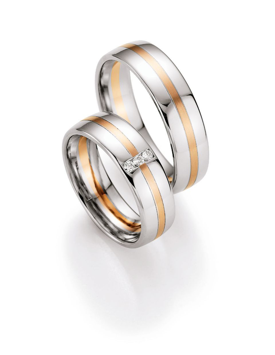 Hochzeitsringe in bicolor mit Silber, Roségold und Stein