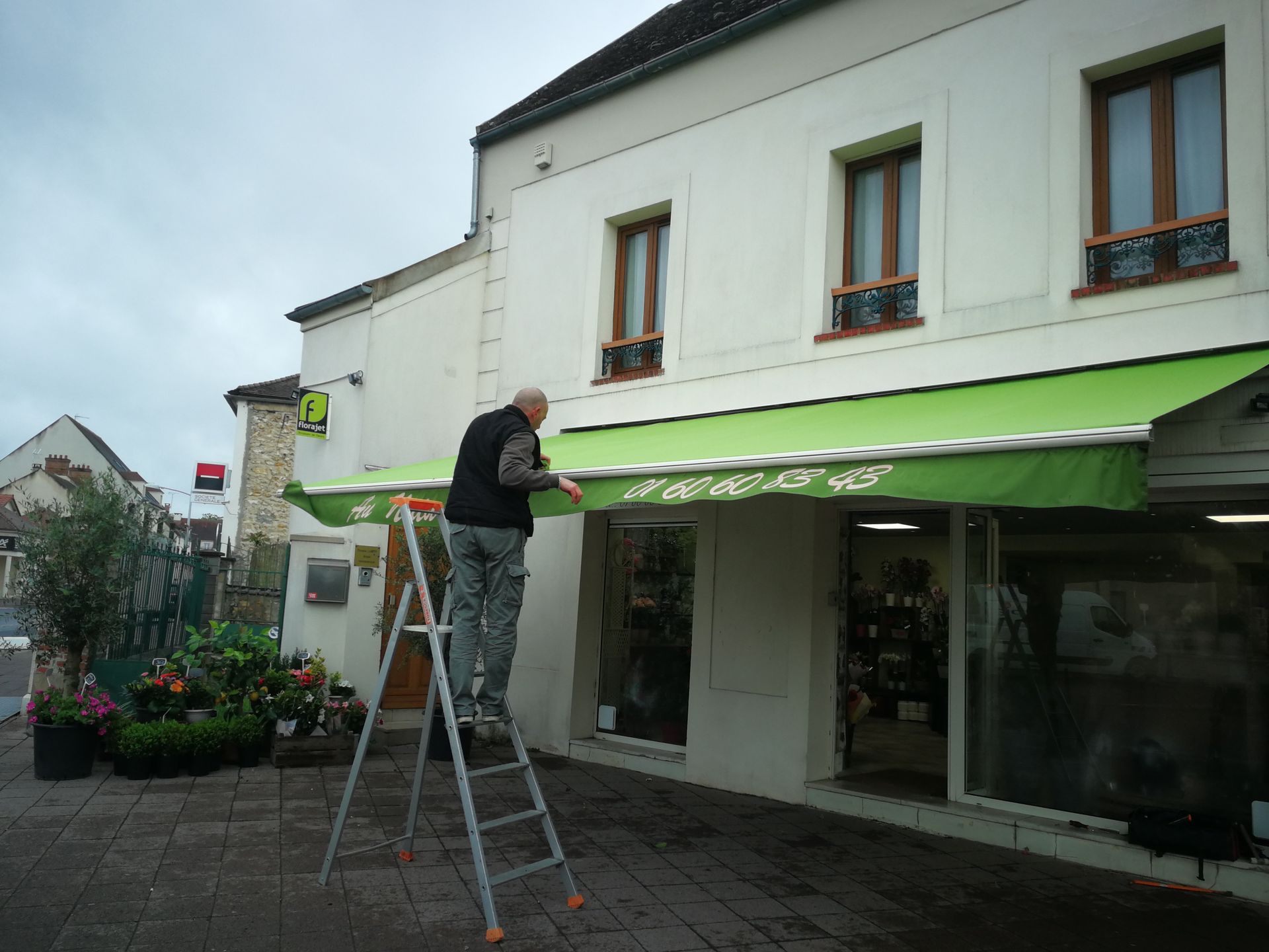 Pose de store extérieur