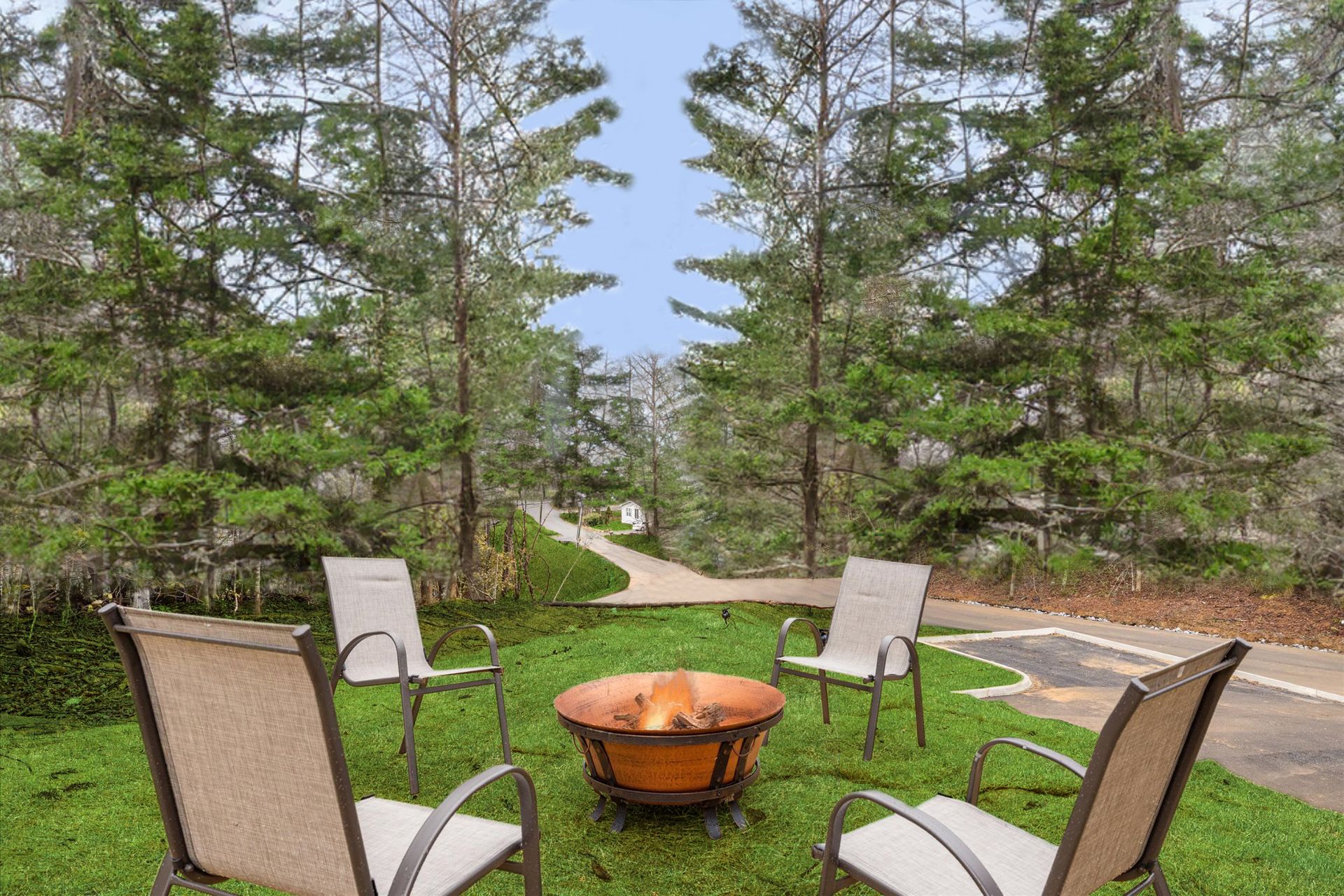 There is a fire pit in the middle of the grass surrounded by chairs. Low Flat Rate Co-Hosting by StayWithDave