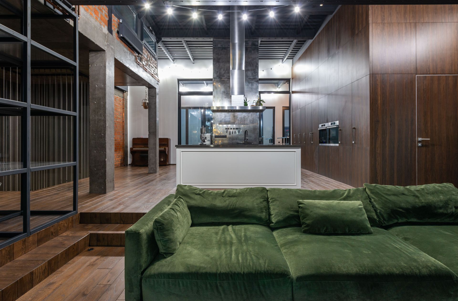 Furnished loft living area with full kitchen
