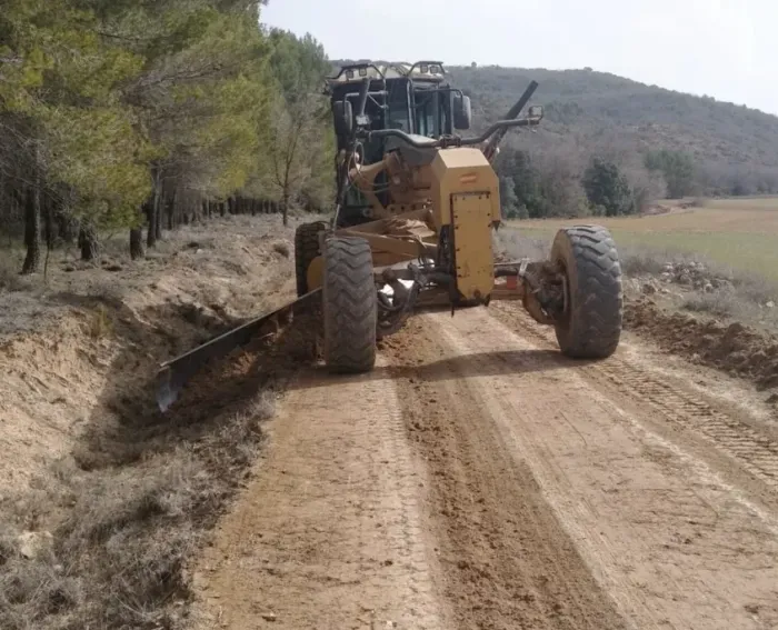 Icono de marcador de posición gris claro con formas de círculo y montaña sobre un fondo pálido.