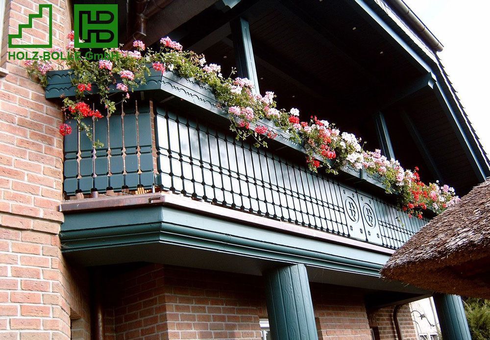 Eine Holztreppe mit Glasgeländer von holz-bolle gmbh