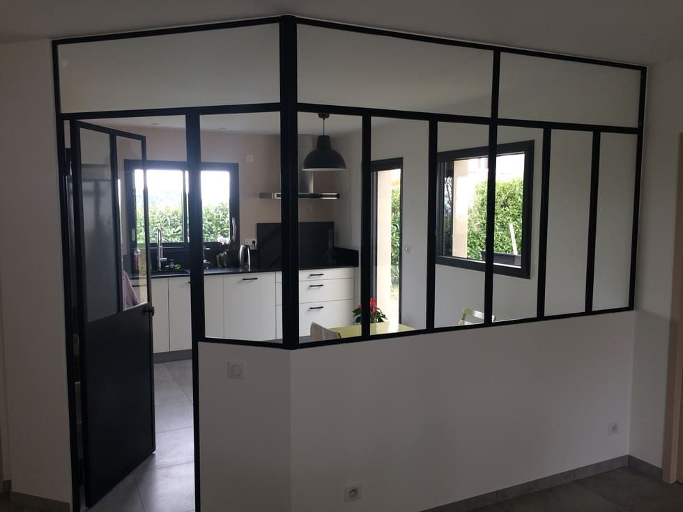 Grande verrière entre deux pièces