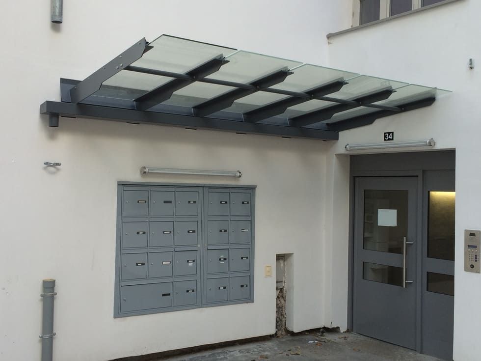 Abri en verre de boites aux lettres