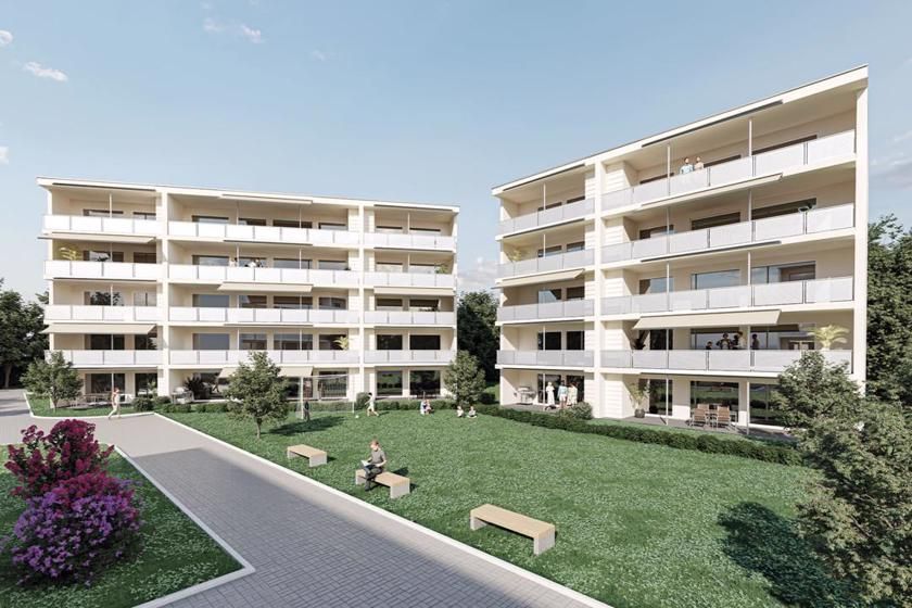 Eine künstlerische Darstellung eines großen Wohnhauses mit vielen Balkonen.