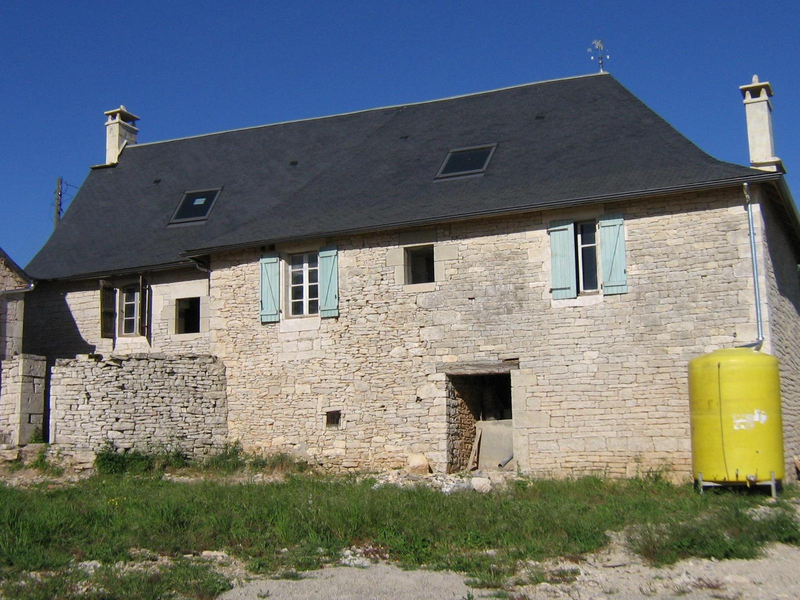 Maison de particuliers : couverture en ardoise à Nespouls