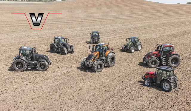 Un tracteur vaporisant des produits sur un champ de légumes