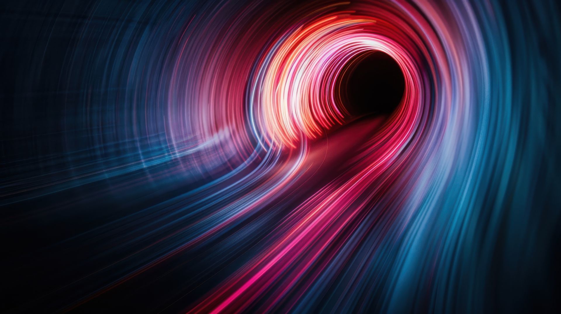 Un tunnel néon avec des traînées de lumières bleues et rouges courant vers le centre