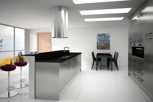 Una cocina con una mesa y sillas.