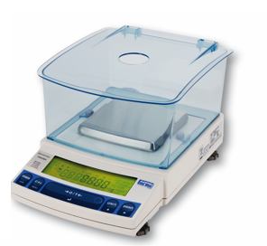 lab technician working with precision scale