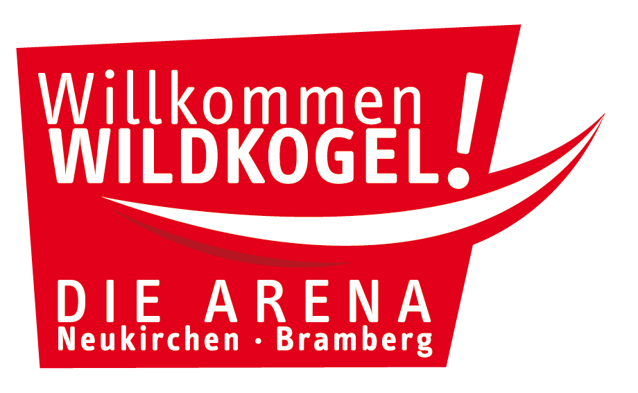 A red sign that says willkommen wildkogel die arena neukirchen bramberg