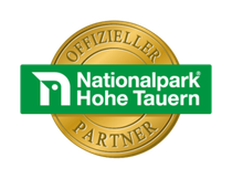 Ein gold-grünes Logo für den Nationalpark Hohe Tauern