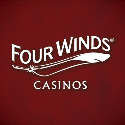 The logo for four winds casinos is on a red background