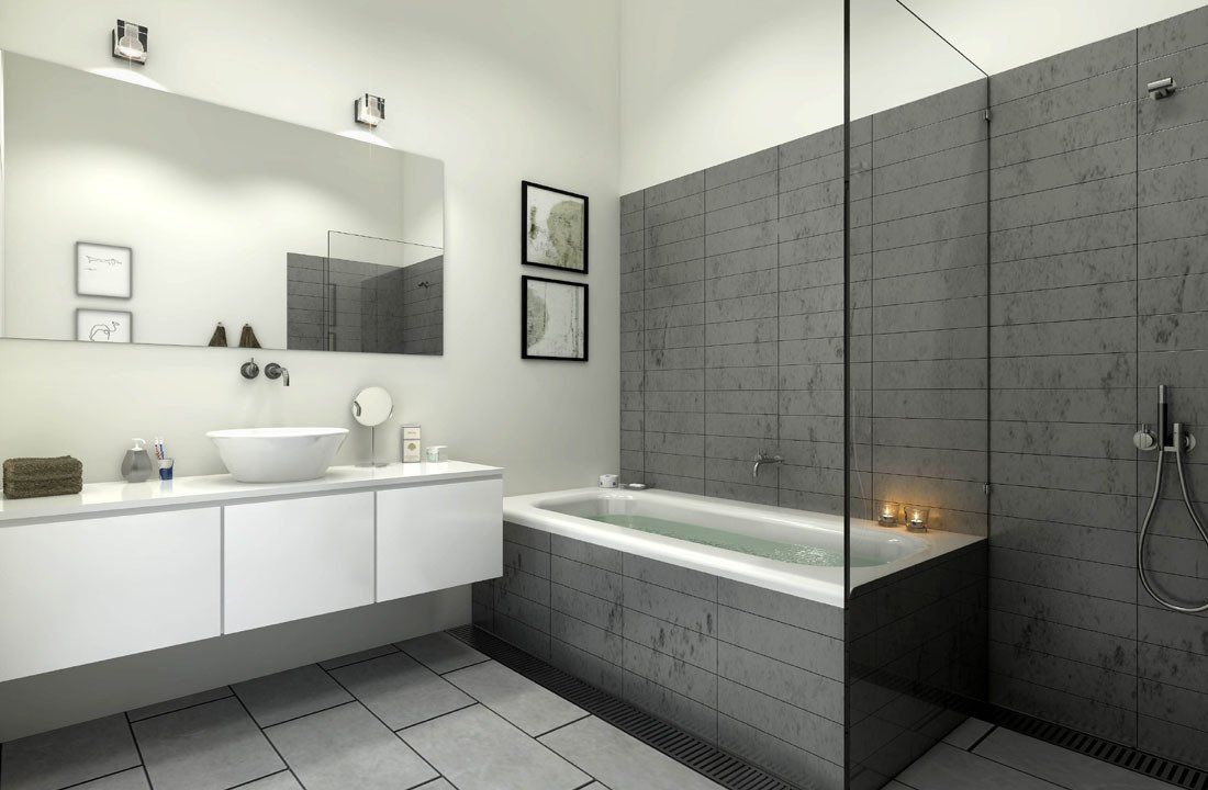 Salle de bains grise avec baignoire et vasque