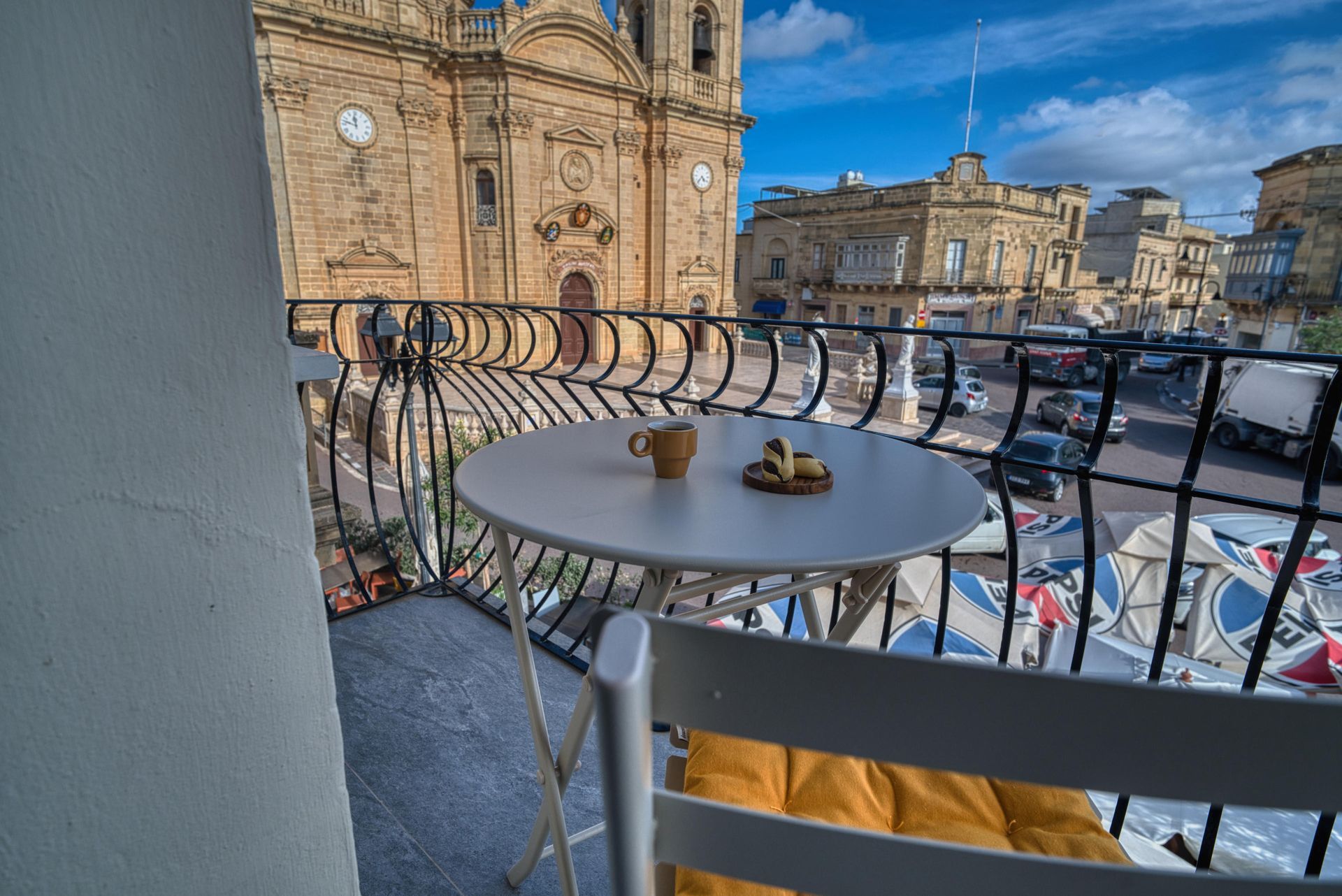 Bistro table on the balcony facing the church