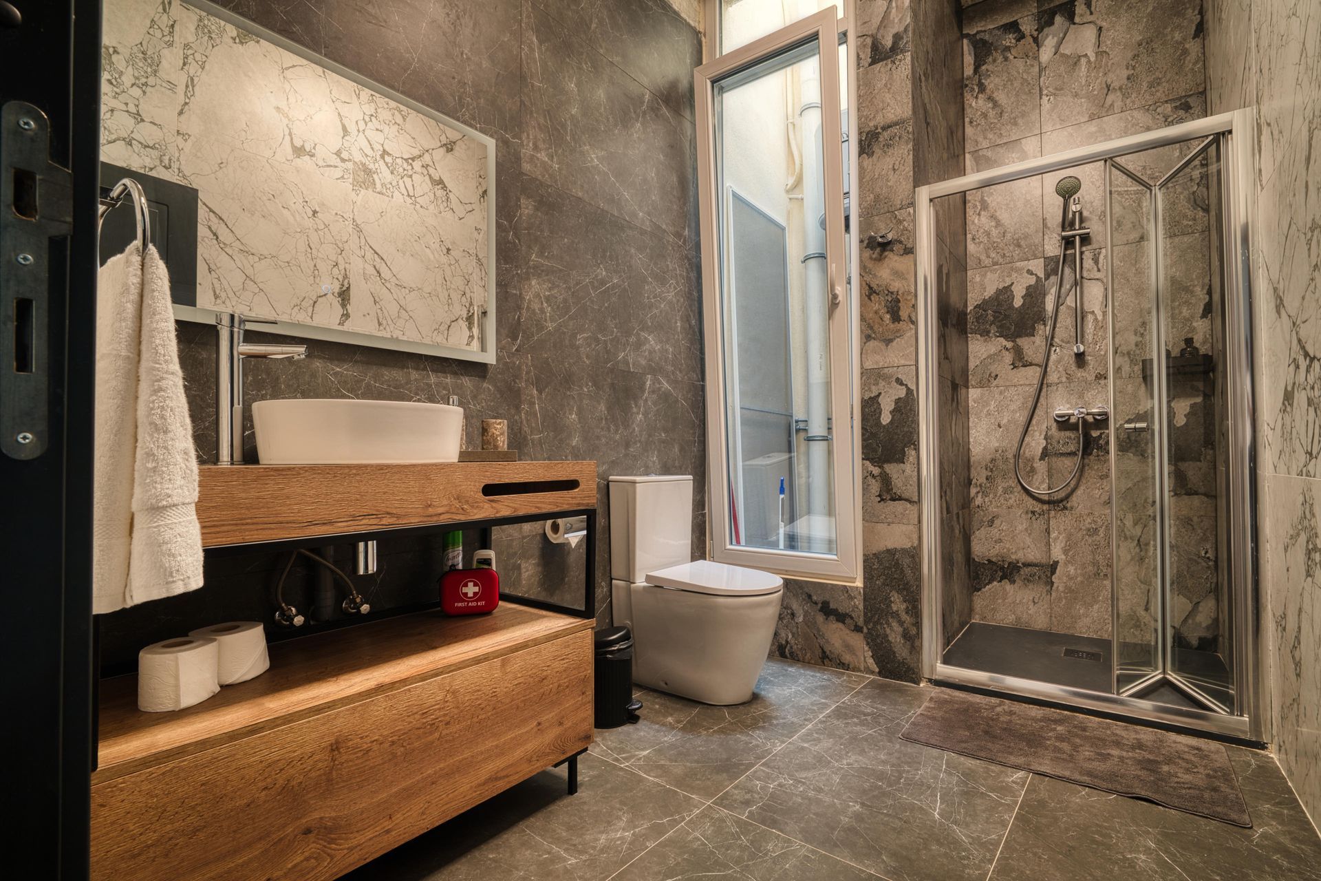 Marble bathroom with walk-in shower