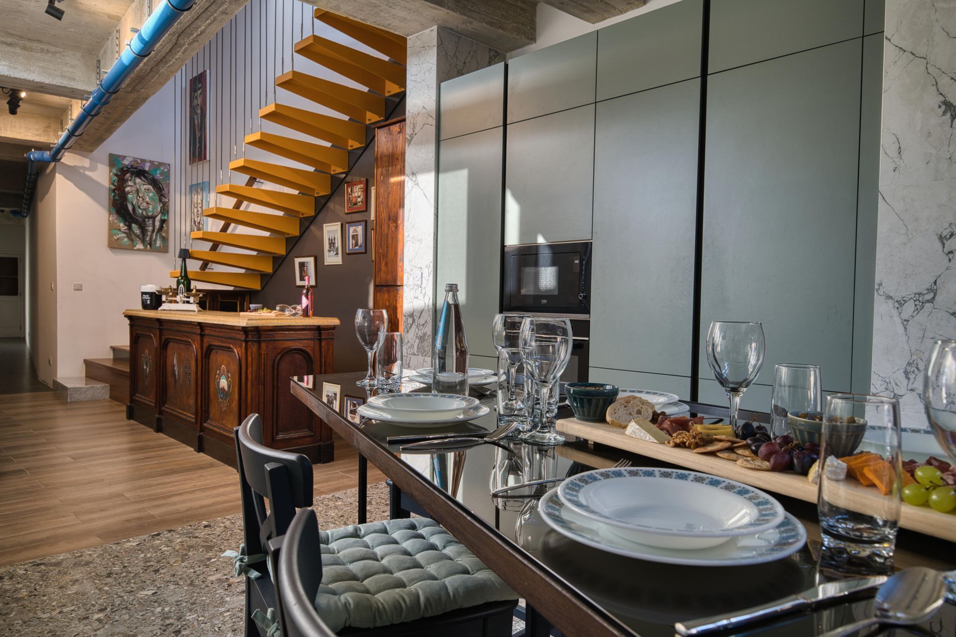 Dining table with a view of the floating oak staircase