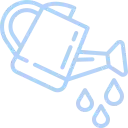 Una regadera de la que salen gotas de agua.