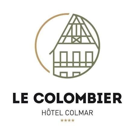 Logo de l’Hôtel Le Colombier Colmar représentant un bâtiment stylisé en or et en gris