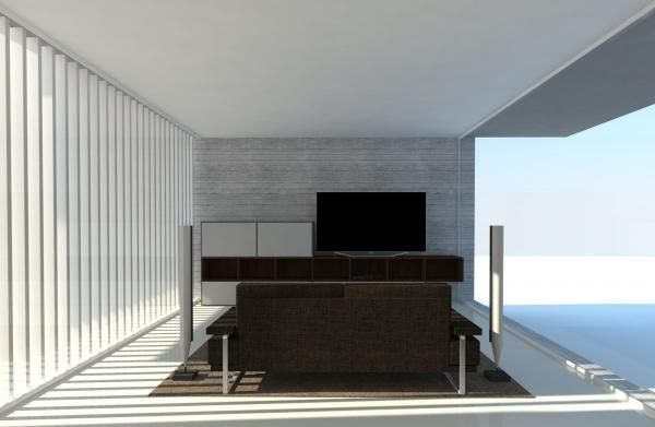 Una sala de estar con un sofá y un televisor de pantalla plana.