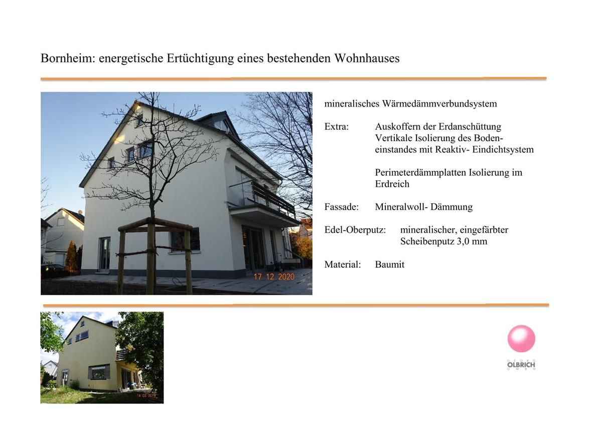 Ein weißes Haus mit einem Baum davor