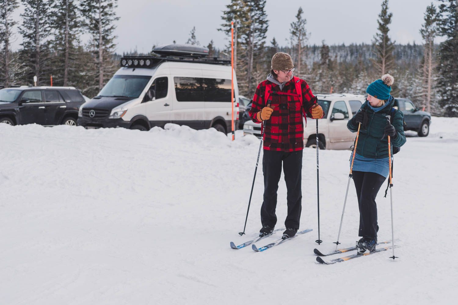 couple on cross country skis during a romantic winter getaway in Central Oregon