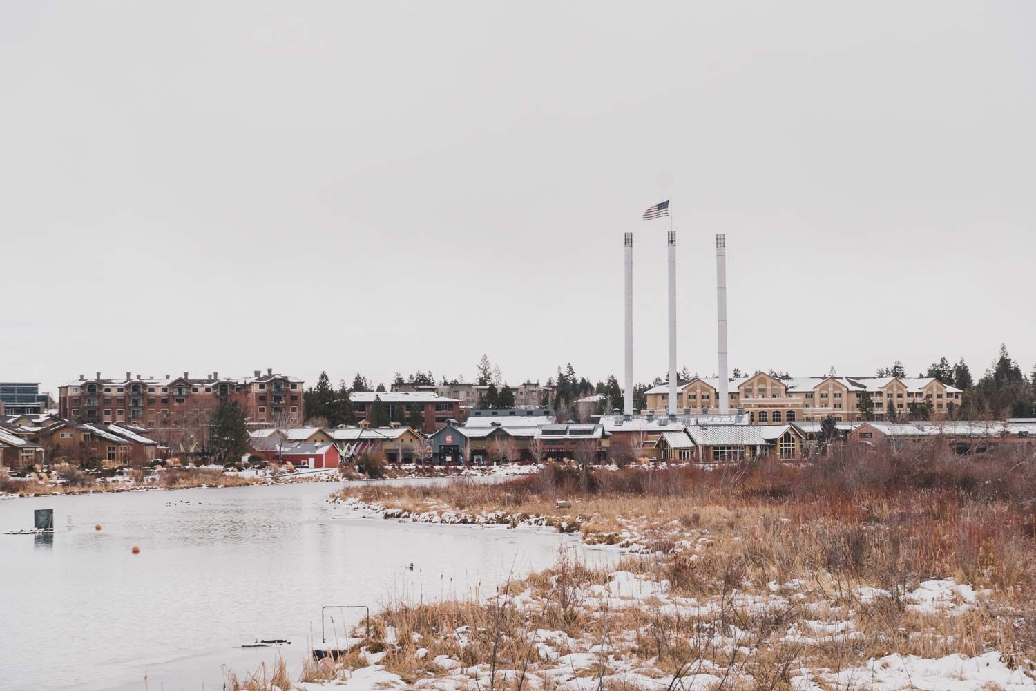photo of the Old Mill District and Deschutes river on a snowy Thanksgiving weekend in Bend