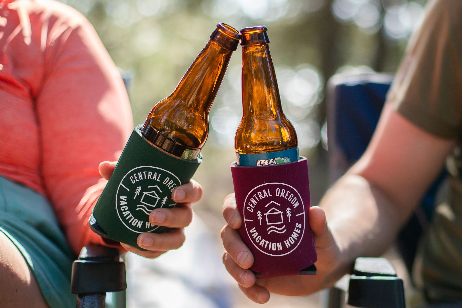 couple sipping out of one tiki drink with two straws to represent the best fall date night ideas in Bend, Sunriver, and Redmond