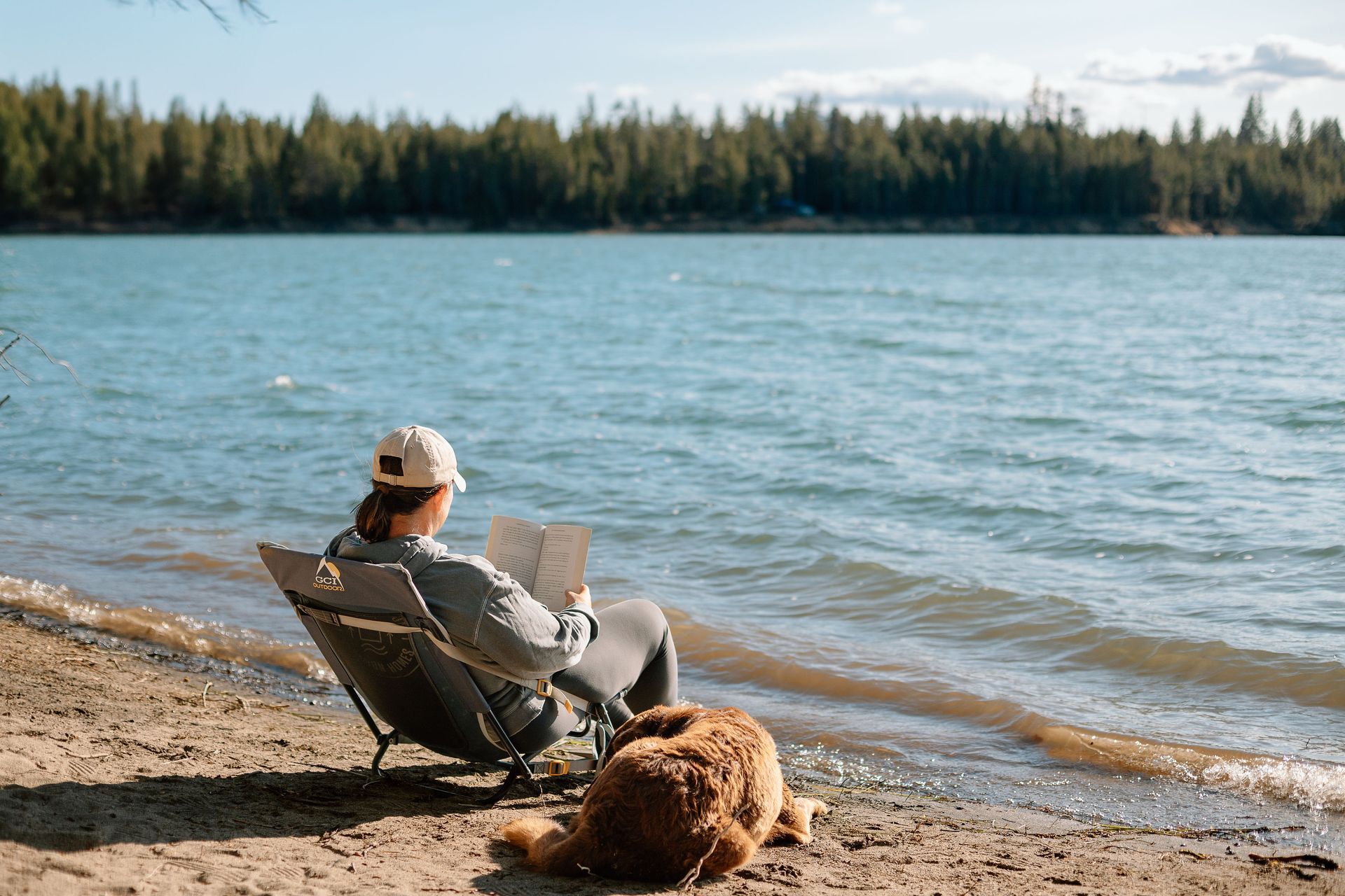 couple sipping out of one tiki drink with two straws to represent the best fall date night ideas in Bend, Sunriver, and Redmond
