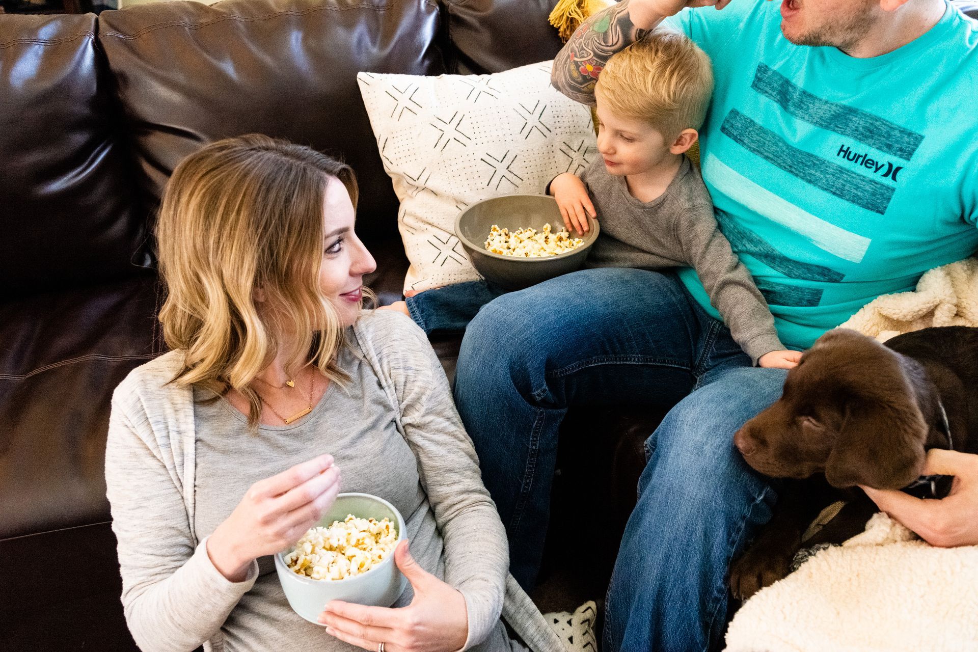 family eating popcorn together during a spring break in Central Oregon
