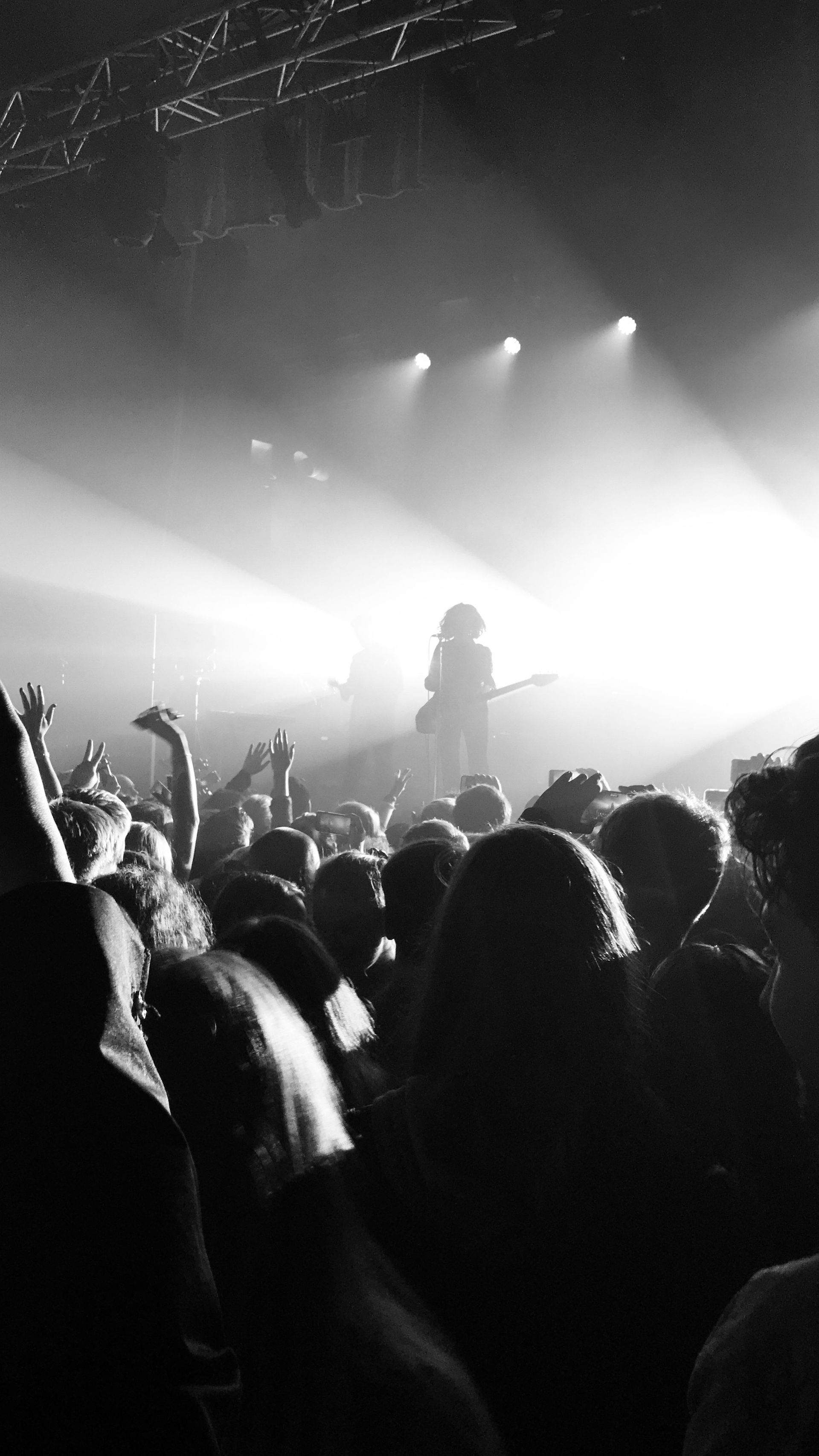 Black and white image of people at a concert at Hayden Homes Amphitheater