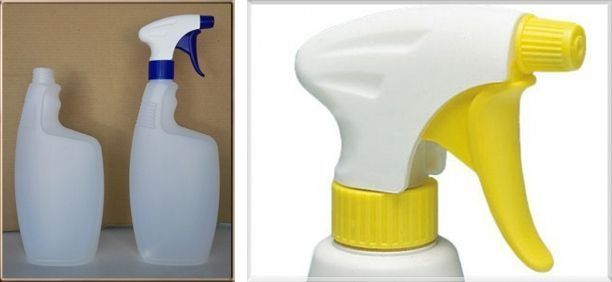 Una botella de spray con tapa amarilla y una botella de spray con tapa blanca
