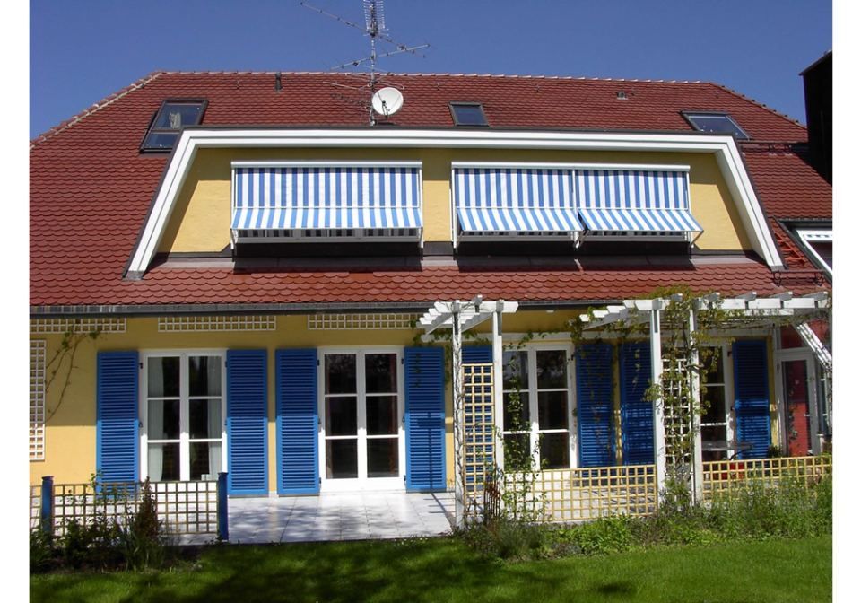 Bild von Landhaus mit Markisen
