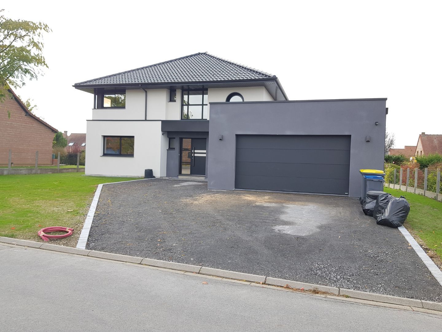 Rénovation d'une façade de maison avec enduit